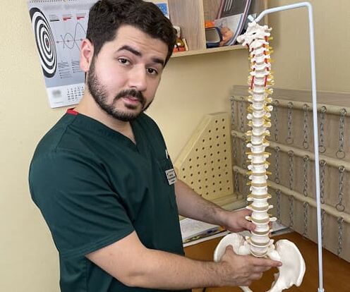 If you have back pain, you should see a general practitioner or neurologist. 